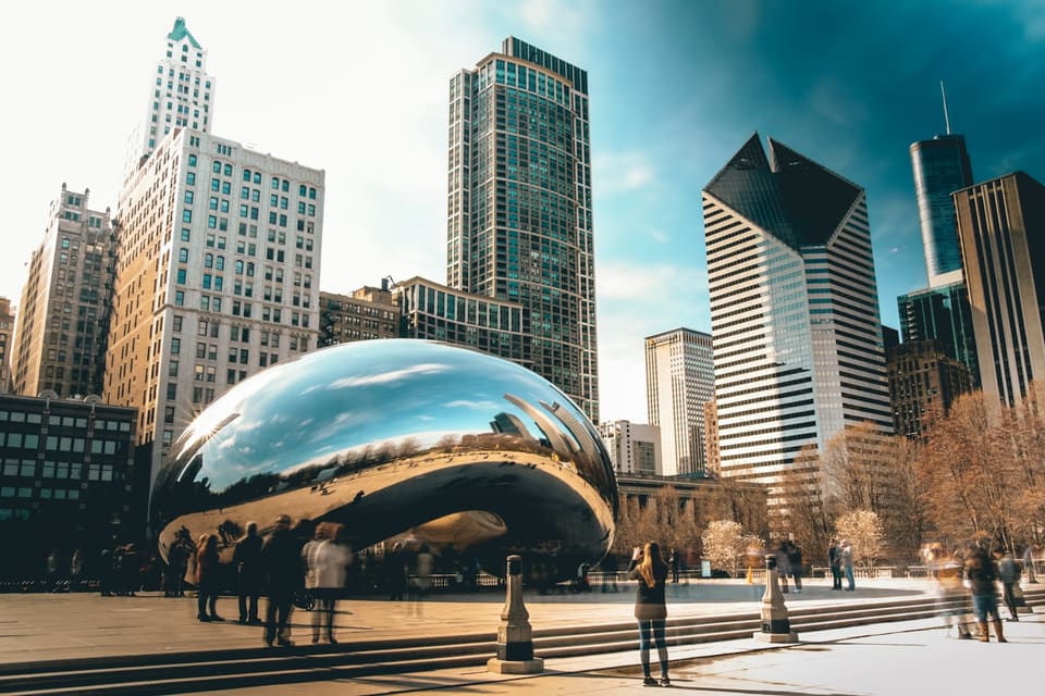 Cloud Gate in Millennium Park reflecting the Chicago skyline
